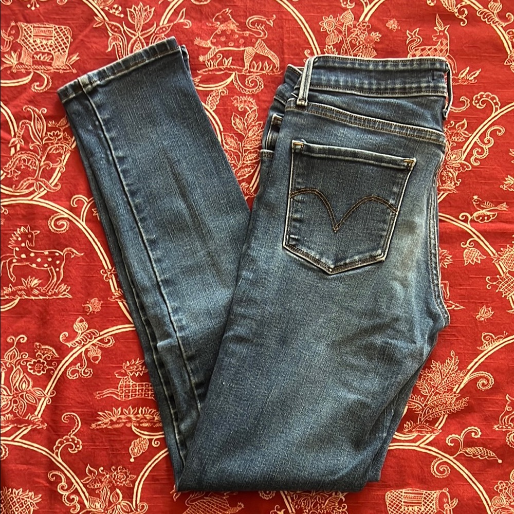 Levi’s mid rise Skinny Jeans with Faded Denim Look size 4